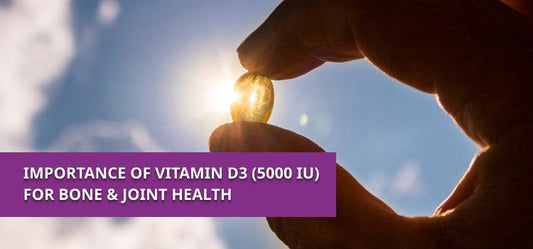 Hand holding a vitamin D3 5000 IU supplement capsule in sunlight, promoting bone and joint health