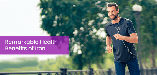 Fit man jogging outdoors, highlighting iron health benefits and Phlox wellness supplements.