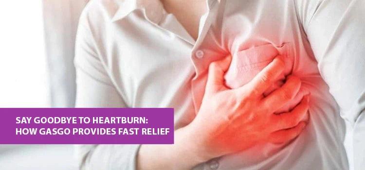 Person clutching chest in pain, highlighting heartburn relief with GasGo from Phlox wellness.
